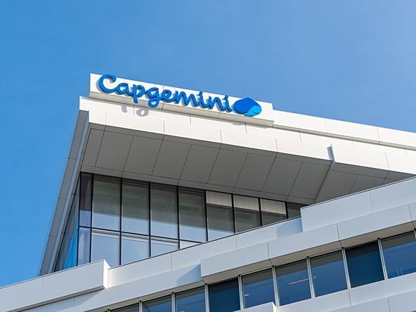 Capgemini office building against a blue sky